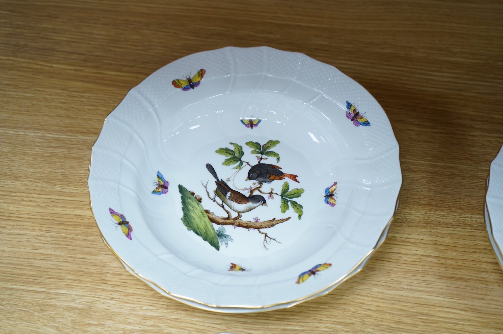 Eight Herend Rothschild 'birds' soup plates, 24cm in diameter